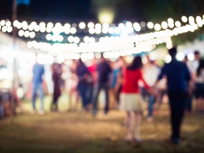 People walking in Festival Event Party outdoor background