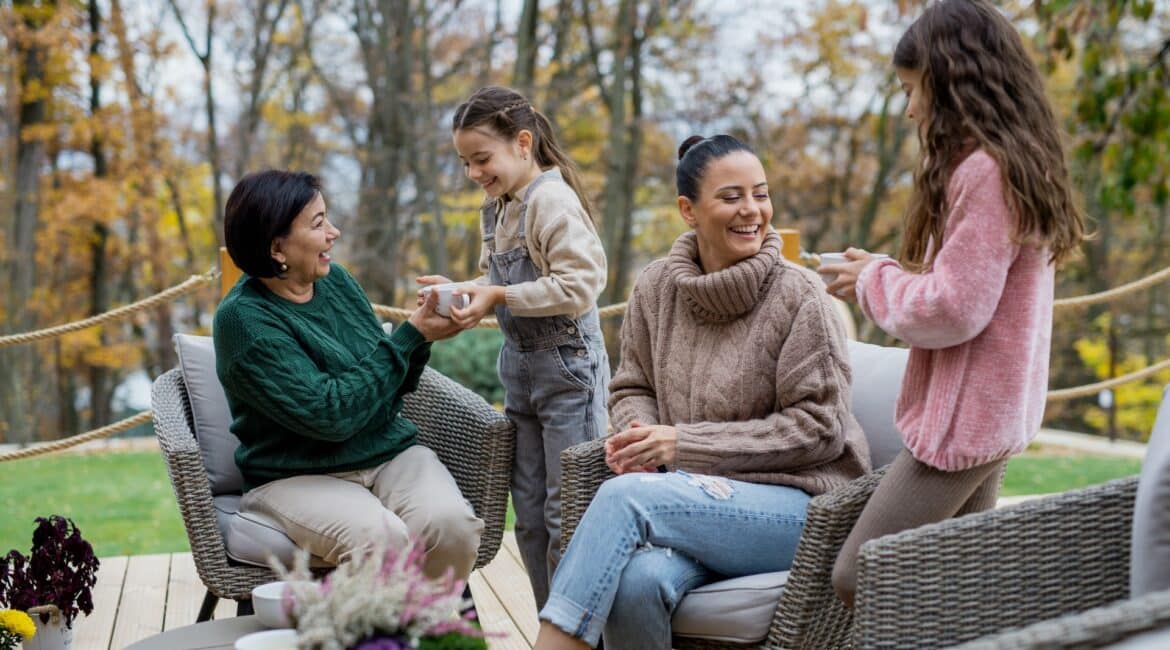 family sitting at the patio