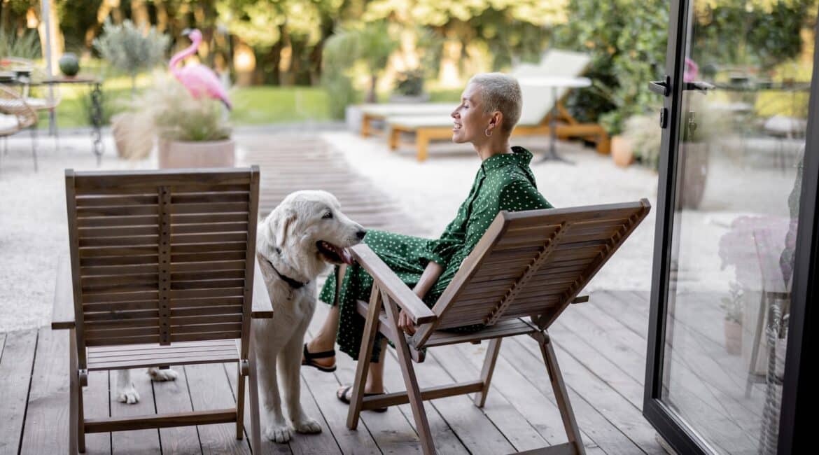 woman and dog in patio