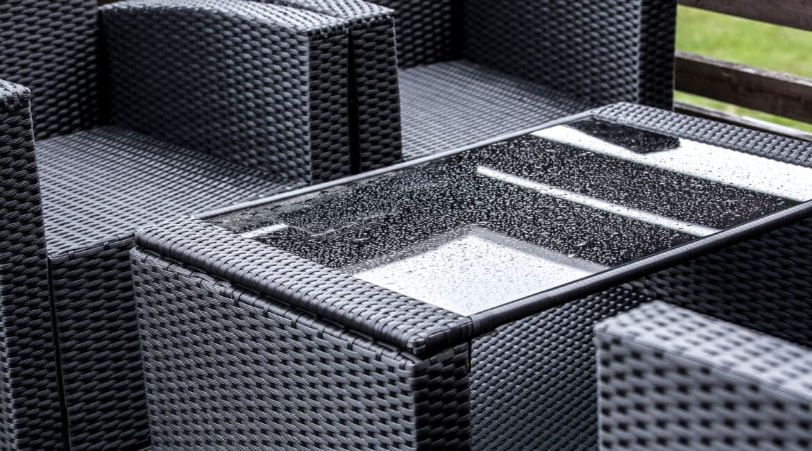 Close,Up,View,Of,Wet,Synthetic,Plastic,Rattan,And,Glass