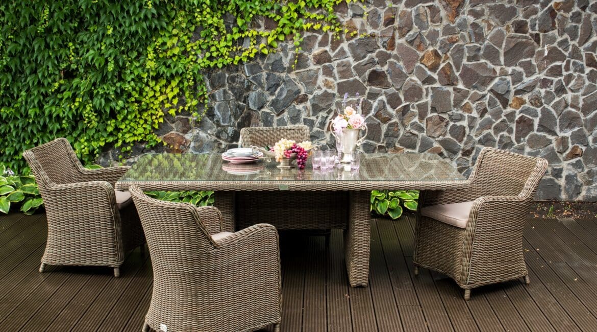 yard,balcony,empty,setting,armchair,furniture,wood,resort,decoration,sofa,dining,relaxation,seat,cafe,contemporary,comfortable,outside,style,concept,exterior,rattan,tourism,verandah,house,interior,patio,modern,public,decor,street,design,vacation,terrace,place,elegant,table,rest,wicker,living,set,chair,relax,restaurant,dinner,home,lifestyle,stone,outdoor,luxury,garden;