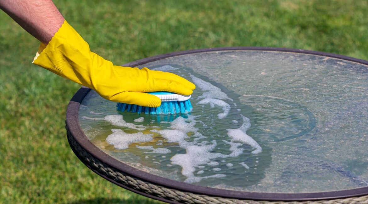 Cleaning,Patio,Furniture,By,Hand,With,Brush.,Spring,Cleaning,,Household