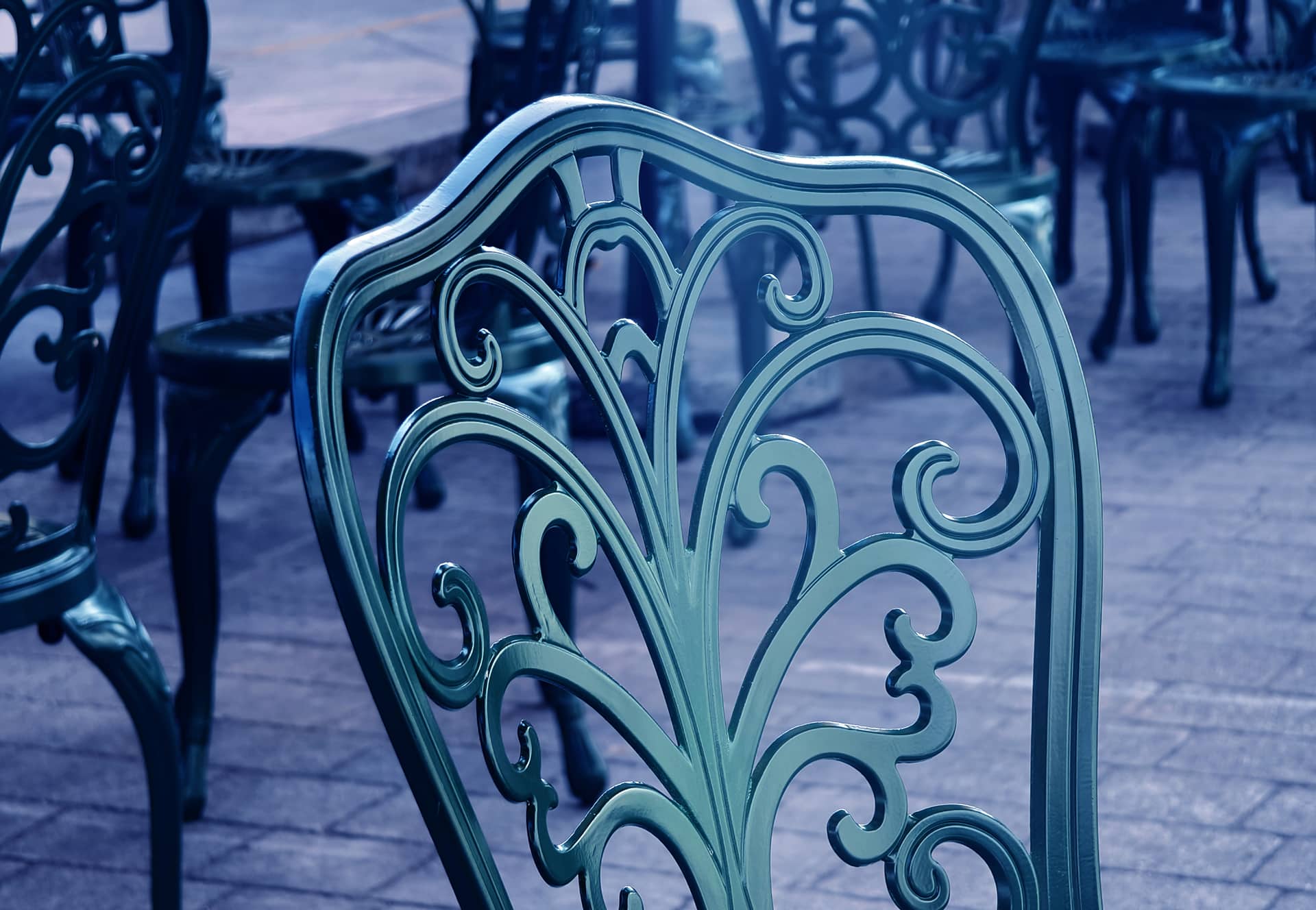 Outdoor dining space with vintage iron furniture trending in 2026