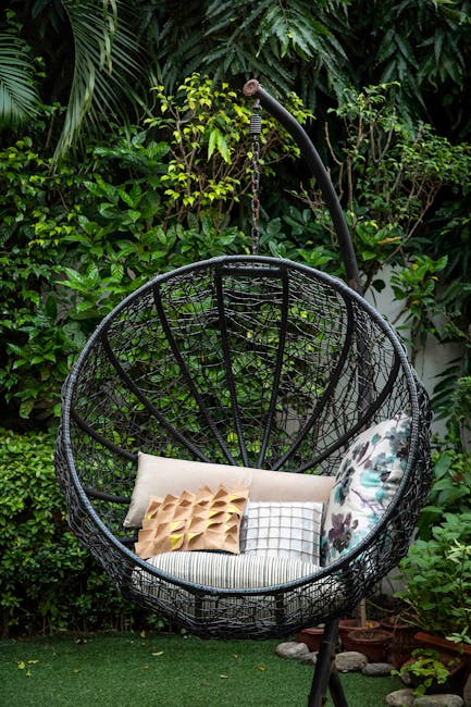 Colorful outdoor throw pillows on a patio chair in a Florida backyard