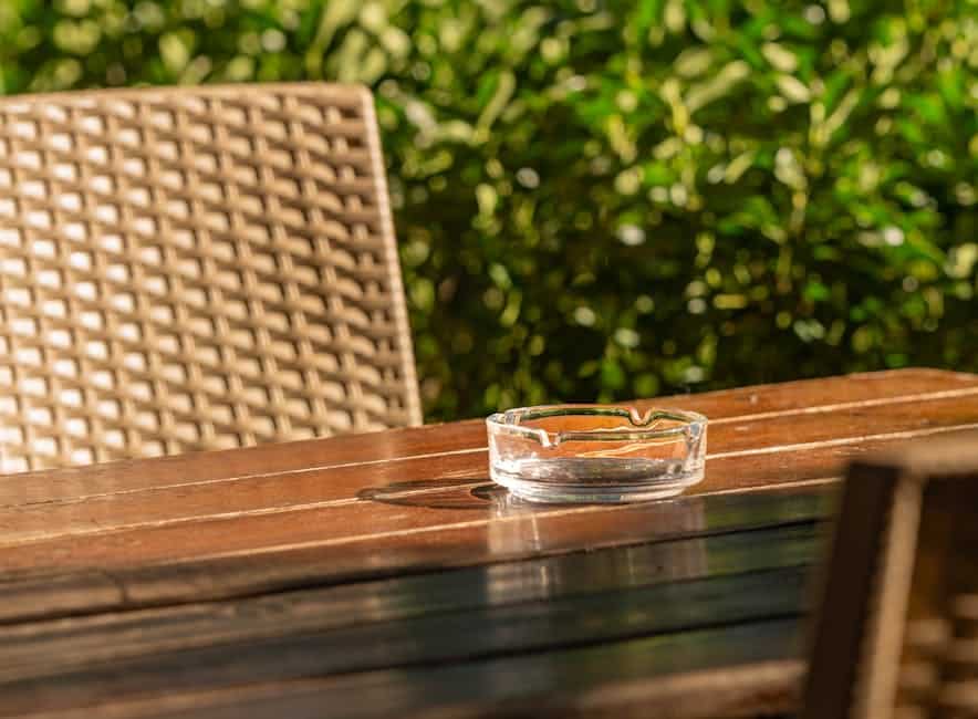 All-weather resin wicker outdoor seating drying in Florida sunlight after mold removal cleaning