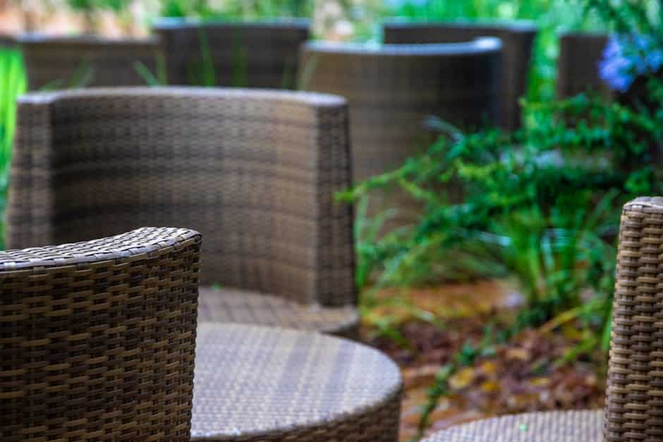Close-up of mold spots on outdoor wicker furniture in a humid Florida patio setting