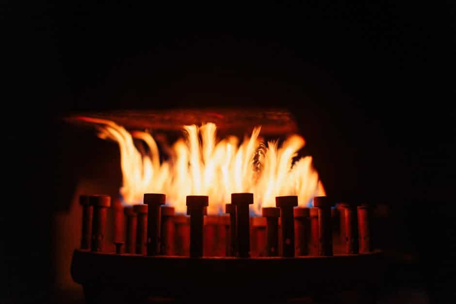 Fire pit conversation set on a Florida lanai with low-flame gas burner and powder-coated aluminum frames
