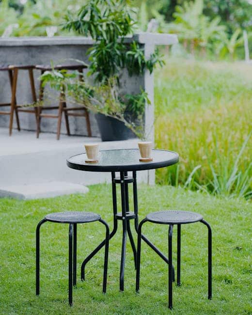 Florida garage spillover patio layout with bar table and rolling furniture on concrete slab