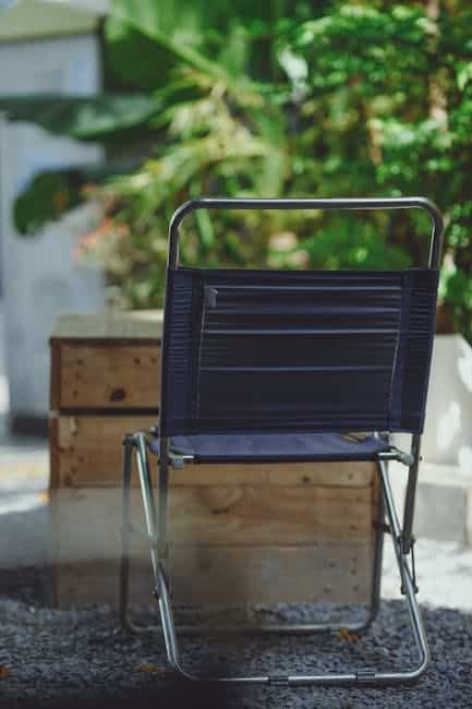Powder-coated aluminum folding patio chairs arranged on a Florida screened lanai